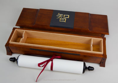 Documents in Calligraphy: Hand made box and scroll. Document written on BFK Rives in ink, watercolor and 23k gold. Box is made of Mahogany, walnut and slate.