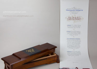 Hand made box and scroll. Document written on BFK Rives in ink, watercolor and 23k gold. Box is made of Mahogany, walnut and slate.