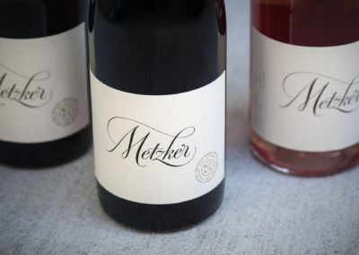 Calligraphy Hand Lettering with subtle flourish images for a wine label design.