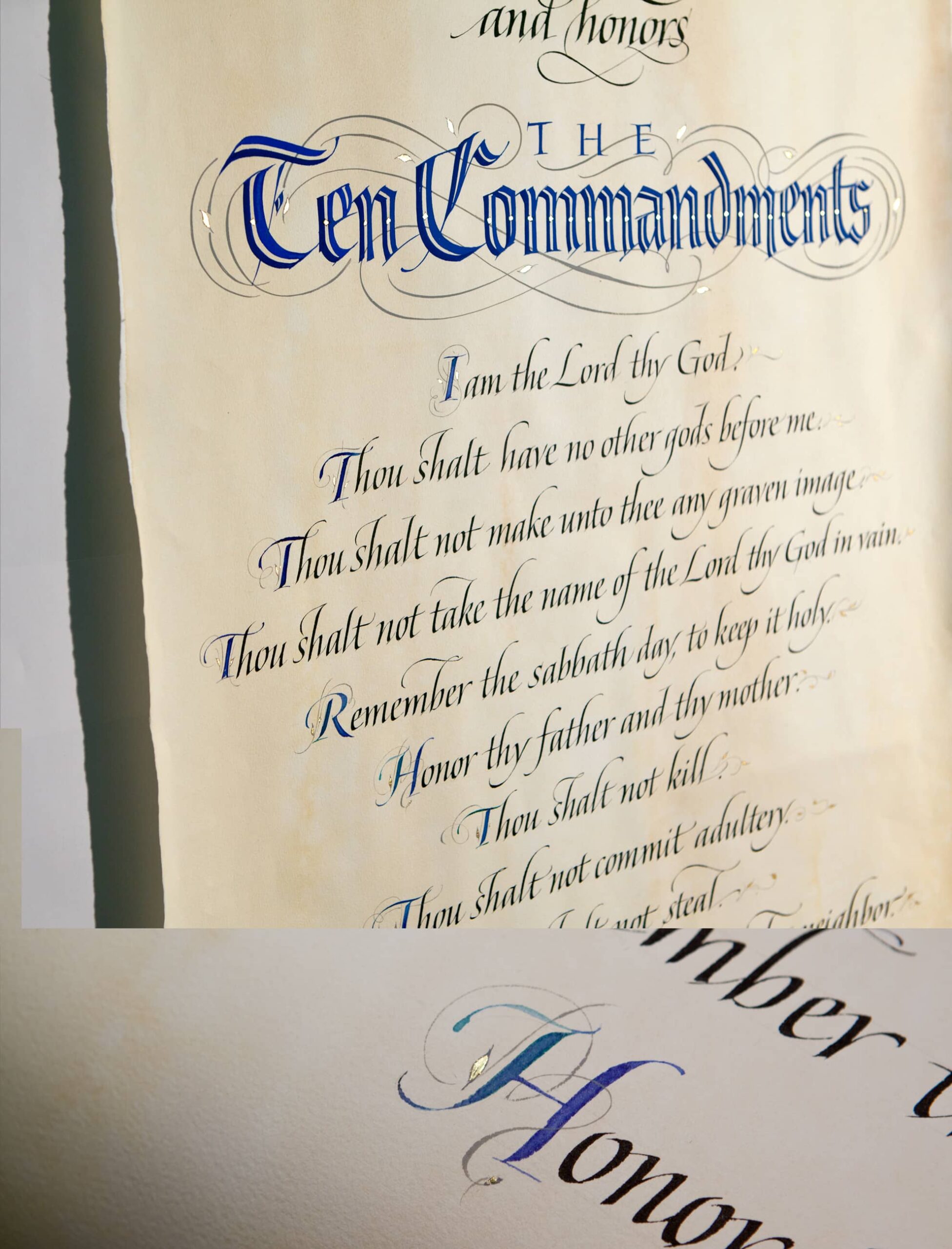 The Ten Commandments written out in Italic and Gothic calligraphy.