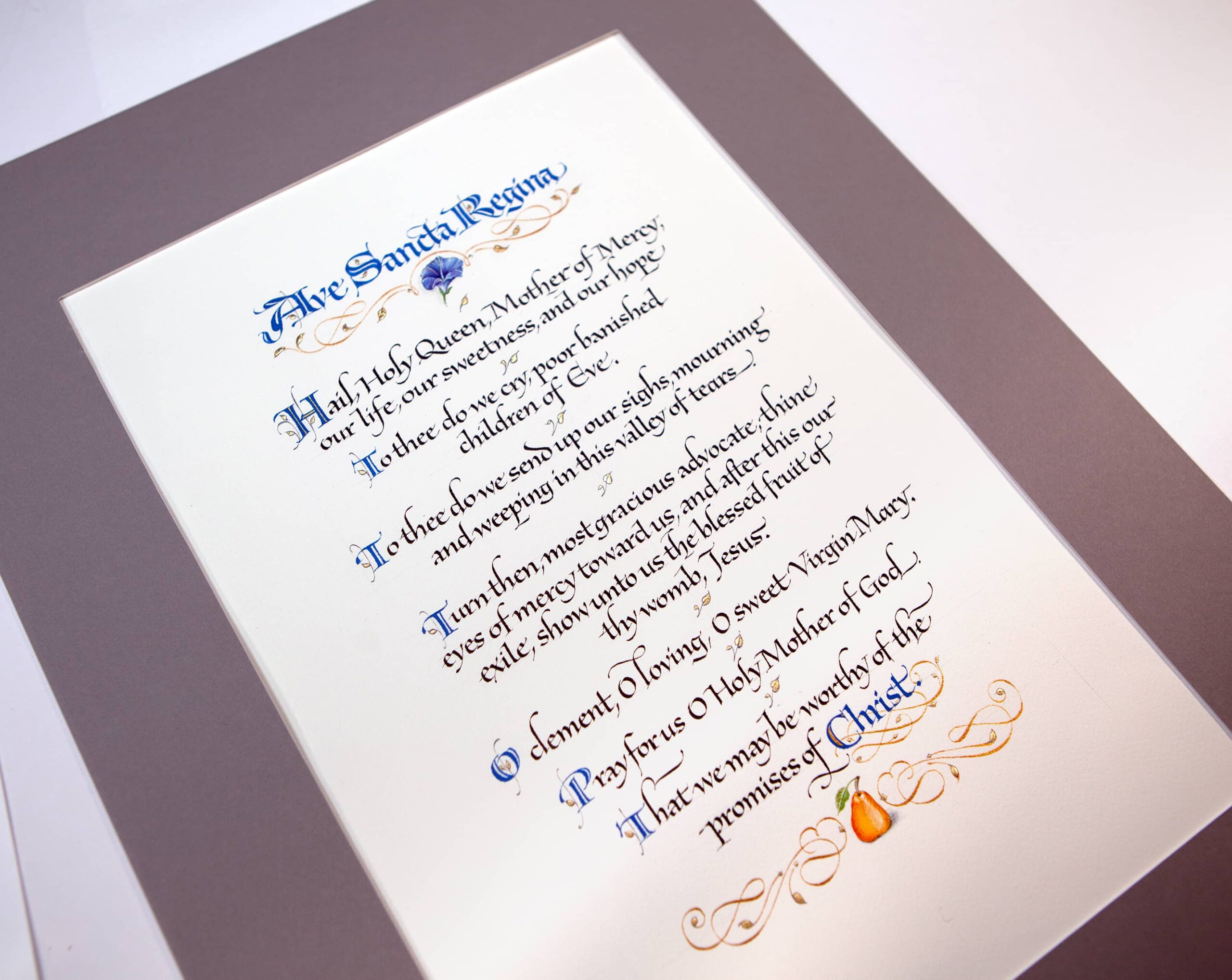 A prayer of the Holy Rosary written in calligraphy with illustrations.